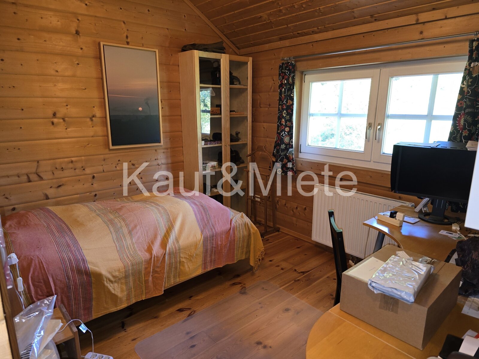 Charmantes Holzblockhaus auf großzügigem Grundstück in absoluter Ruhelage